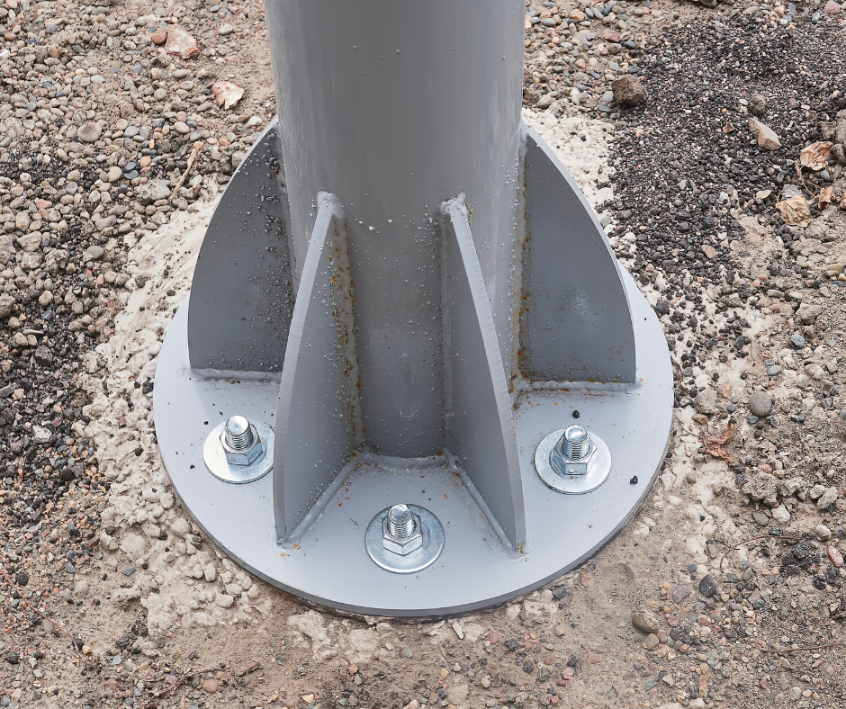 Lally Columns Contractor New York - A Closeup Picture of a New Lally Column Bolted to the Ground