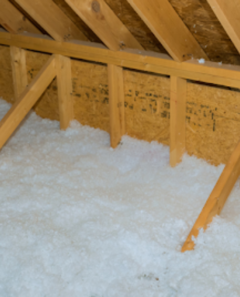 Spray Foam Insulation Contractors in Forest Hills, NY - Blown-In Fiberglass Insulation in an Attic