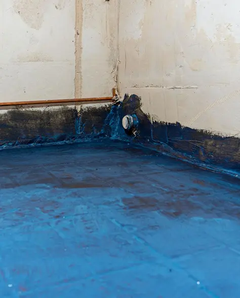 Water Damage Restoration Contractors in Bellerose, NY - Waterproof Coating on a Basement Floor