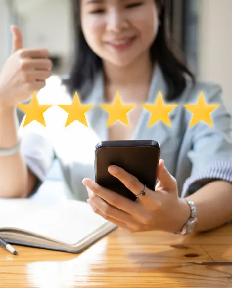 Foundation Contractors in Long Island, NY - A Woman Giving a Five Star Review on Her Phone