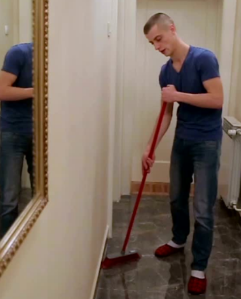 Water Damage Restoration Contractors in Carroll Gardens, NY - A Worker Sweeping a Hallway