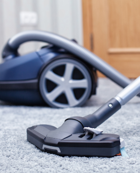 Water Damage Restoration Contractors in Bay Ridge, NY  - A Commercial Vacuum Sucking Up Water from the Carpet to Avoid Water Damage