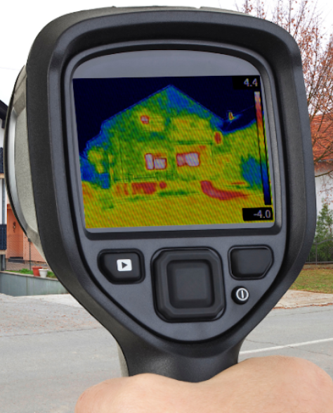 Water Damage Restoration Contractors in Shirley, NY - A Man Holding an Infra Red Scanner<br />

