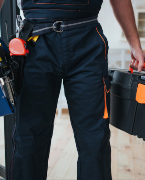 Water Damage Restoration Contractors in Astoria, NY - A Man Holding a Toolbox and Clipboard<br />

