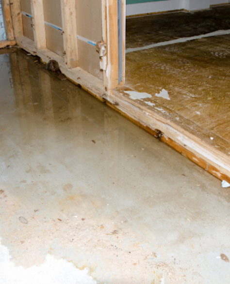 Water Damage Restoration Contractors in Corona, NY - A water-damaged floor. 