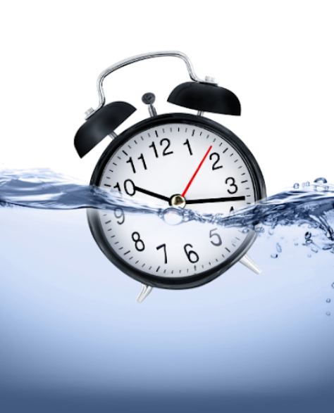 Water Damage Restoration Contractors in Dyker Heights, NY - A Clock Halfway Submerged Under Water Floating