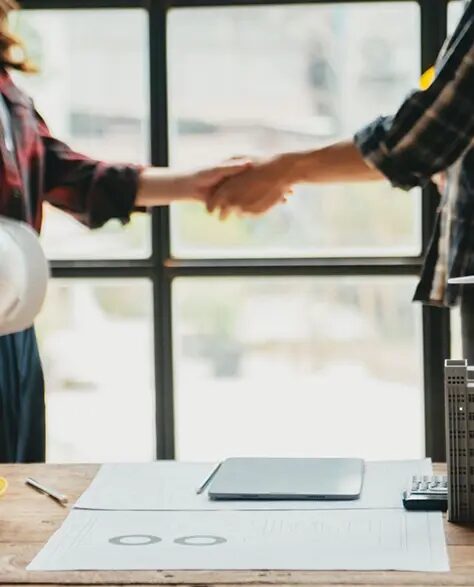 top-rated-water-damage-restoration-contractors-in-Lindenhurst-ny-1.7 Water Damage Restoration Contractors in Lindenhurst, NY - A Homeowner Is Happily Shaking Hands With a Contractor Over a Successful Deal