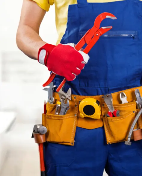 Water Damage Restoration Contractors in Deer Park, NY - A Man with a Tool Belt and a Wrench Giving a Thumbs Up