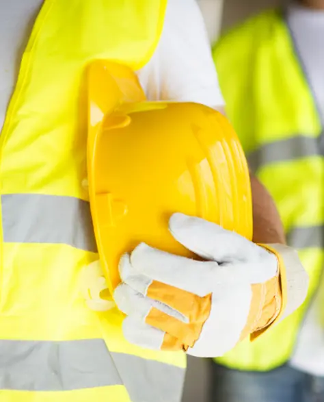 Water Damage Restoration Contractors in Deer Park, NY - Two Construction Workers Wearing Yellow Vests