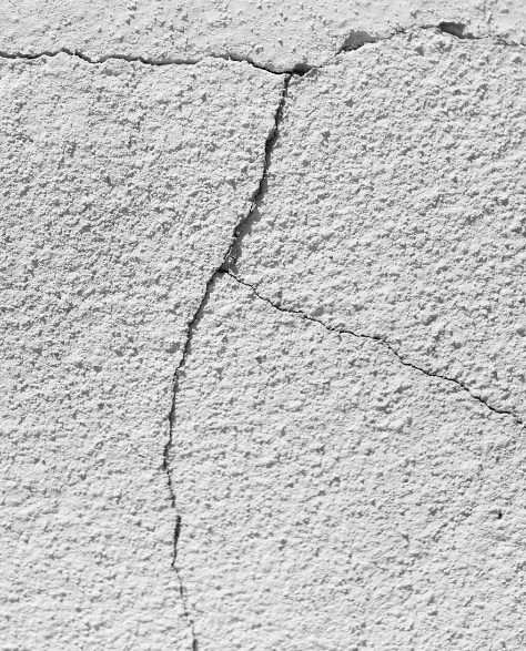 Foundation Repair Contractors in Commack, NY - A Closeup Picture of a Cracked Concrete Foundation<br />
