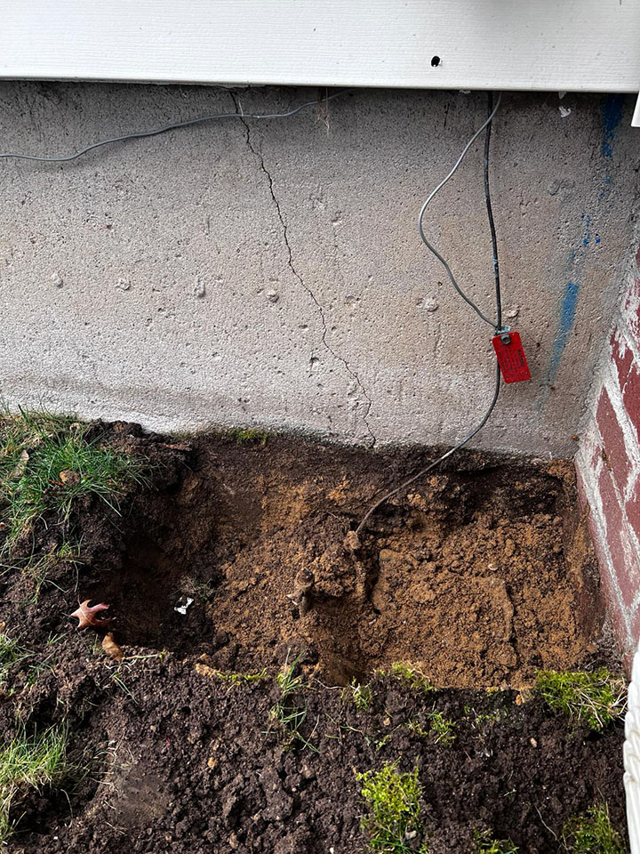 Exterior digging to waterproof the foundation