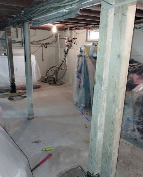 Foundation Repair Contractors in Hauppauge, NY - A Basement and Foundation Repair Project by Zavza Seal Showing a Lally Columns Installation<br />
