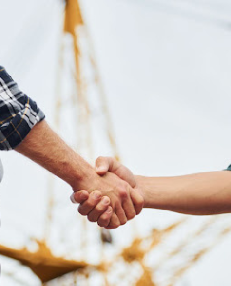 Top-Rated Foundation Repair Contractors in Huntington Station, NY - Zavza Seal Foundation Repair Foreman Shaking Hands with Another Contractor<br />
