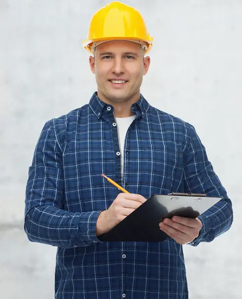 Water Damage Restoration Contractors in Long Island City, NY - A worker in a hard hat and a clip board writing something down on it 