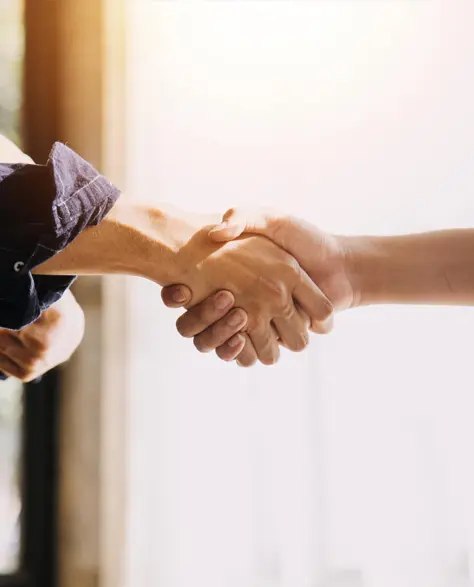 Water Damage Restoration Contractors in Queens Village, NY - Two Construction Workers Shaking Hands