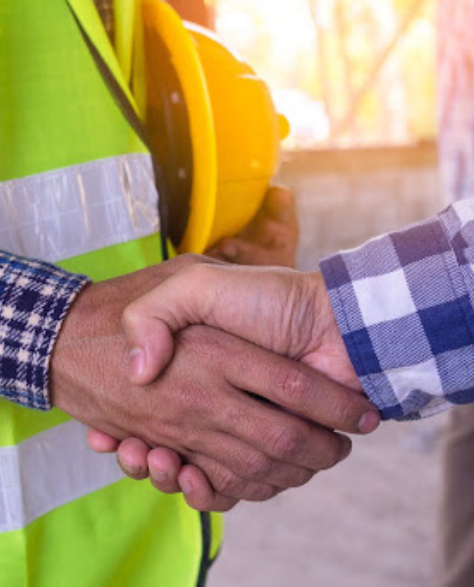 Top-Rated Foundation Repair Contractors in Bensonhurst, NY - A Construction Worker and a Homeowner Shaking Hands 