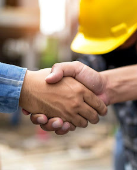 Top-Rated Foundation Repair Contractors in Jamaica, NY - A Foreman and Homeowner Shake Hands to Agree on Project Terms<br />
