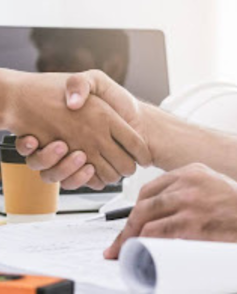 Top-Rated Foundation Repair Contractors in Jamaica, NY - Two Construction Men Shaking Hands<br />
