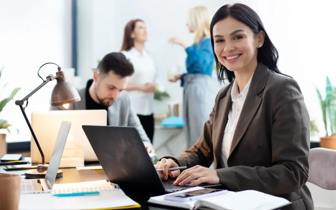 Finance: A lady accountant at her workstation with her laptop