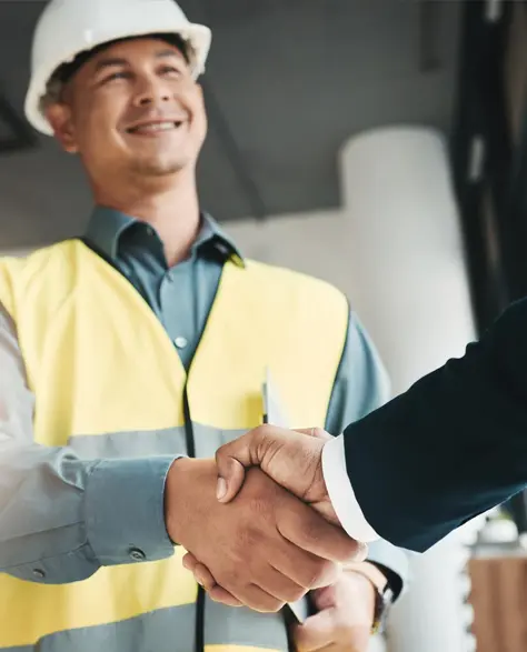 Foundation Support Contractor in New York - A Contractor Shaking Hands with a Business Owner