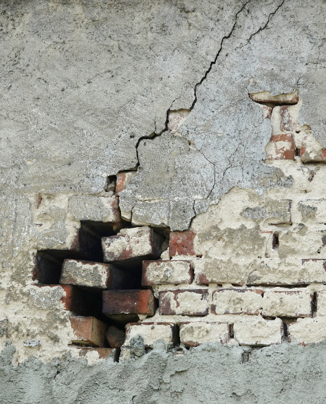 Foundation Repair Contractors in Gowanus, NY - A Brick Wall and Foundation Showing Damage<br />
