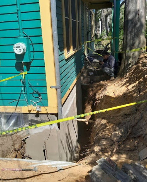 Foundation Repair Contractors in Borough Park, NY - A Foundation Crack Repair Project by Zavza Seal Showing Workers on Break<br />
