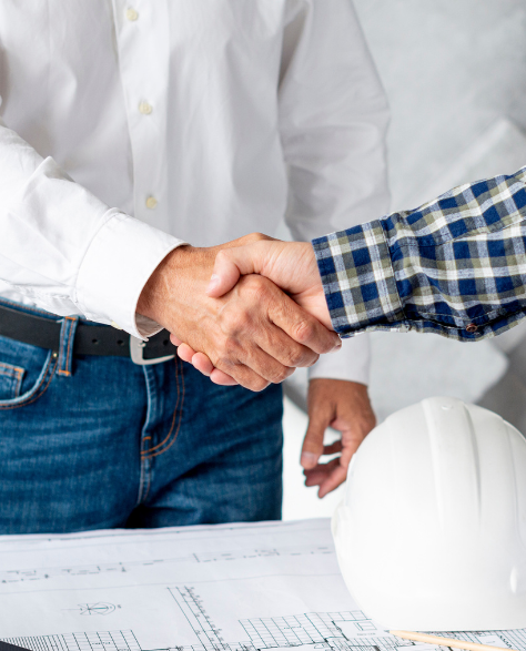 Foundation Repair Contractors in Park Slope, NY - Two Construction Men Shaking Hands<br />
