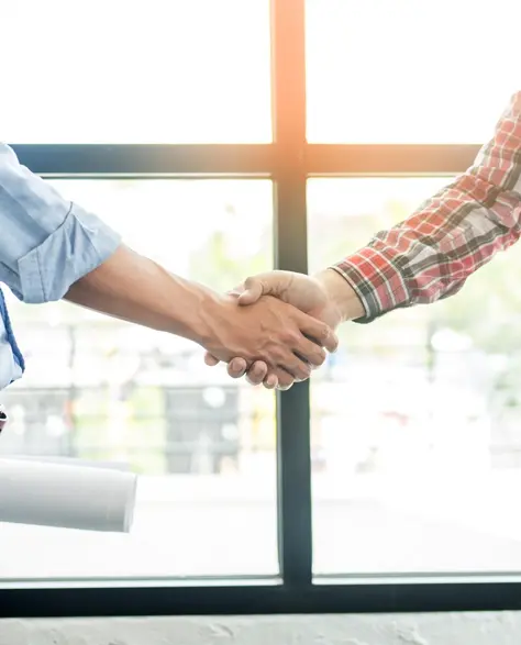 Water Damage Restoration Contractors in Woodside, NY - A Construction Foreman Shaking Hands with a Contractor