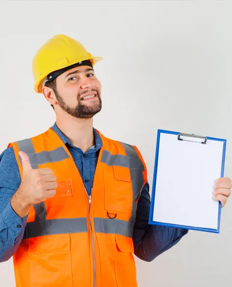 Water Damage Restoration Contractors in Woodside, NY - A Water Damage Repair Technician Smiling and Holding a Clipboard