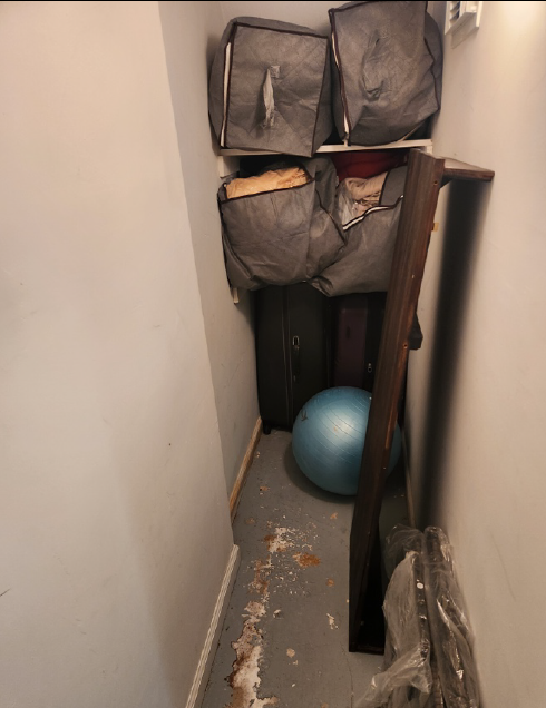 Continuation of water damage within the closet room of the basement