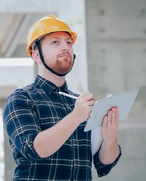 waterproofing-cement-contractor-in-new-york-1.52 Waterproofing Cement Contractor New York - A Foundation Inspector Writing on a Clipboard