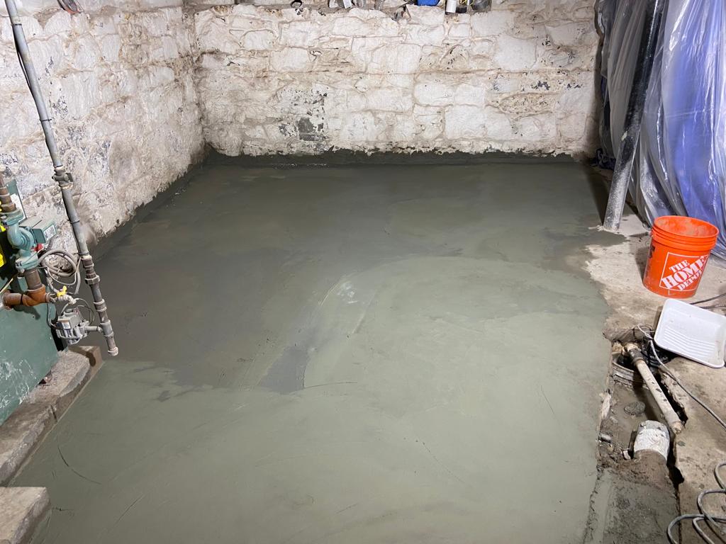 After the successful installation of the entire waterproofing system the team sealed and put concrete over the area for longevity and a good finish. 