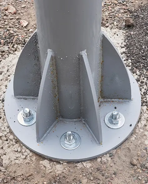 Lally Columns Contractor New York - A Closeup Picture of a New Lally Column Bolted to the Ground