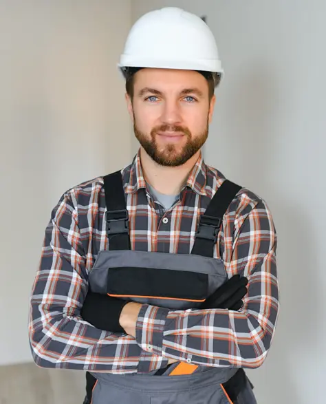 Basement Cracks Repair Contractor New York - A Contractor Smiling for the Camera