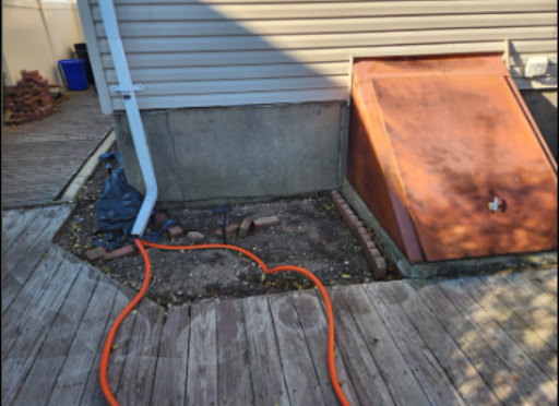 A badly water intruded area the basement of a Long Island home