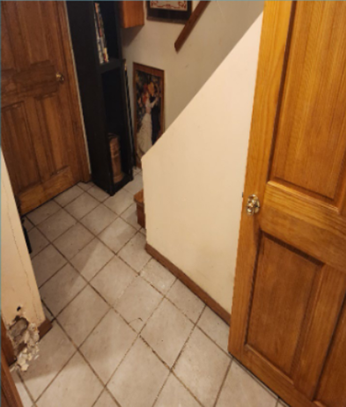 Basement in Brooklyn in need of waterproofing and restoration. The wearing in the wall is very prominent with spalling and water damage.