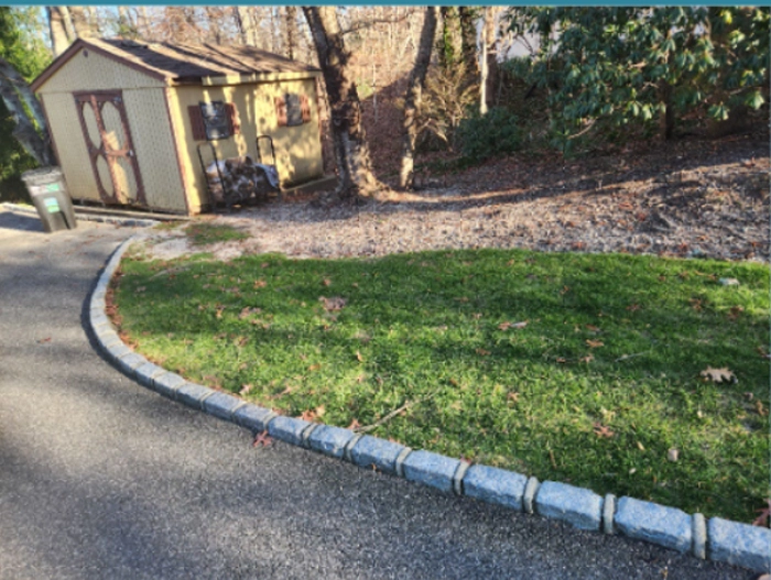 The concrete driveway in Dix Hills that required trench drain installation.