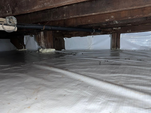 A newly encapsulated crawl space to provide a good quality crawl space vapor barrier.