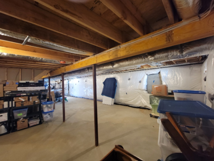 The basement of the property in Smithtown, NY in need of waterproofing, mold remediation, and insulation. The interior looks drab, has seepage, and as reported by the inspectors smells drafty.