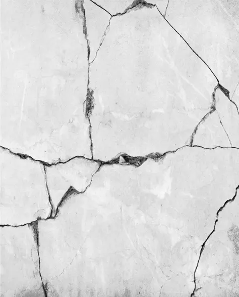 A broken concrete slab with cracks