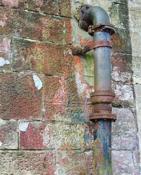 A rusted old water pipe