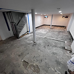 Basement floor in poor condition with broken and cracked floor