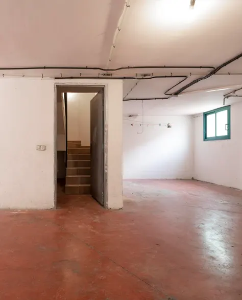 A basement with installed egress windows.