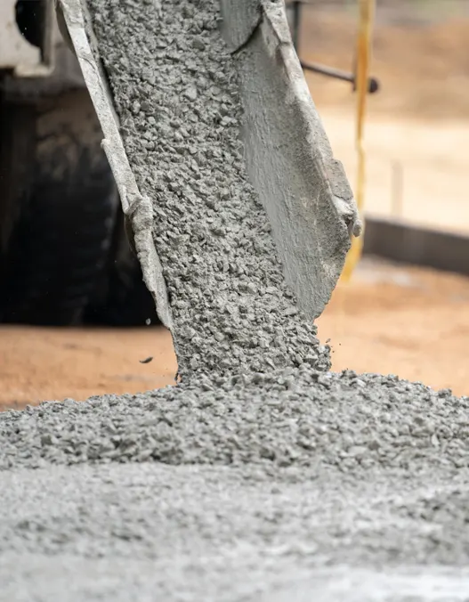 Concrete Installation and Pouring: Concrete pouring taking place through a machine