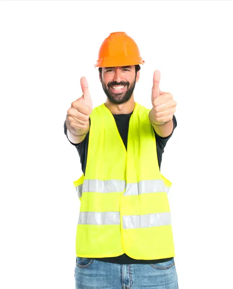 A construction worker in a hard hat and vest giving thumbs up with both hands