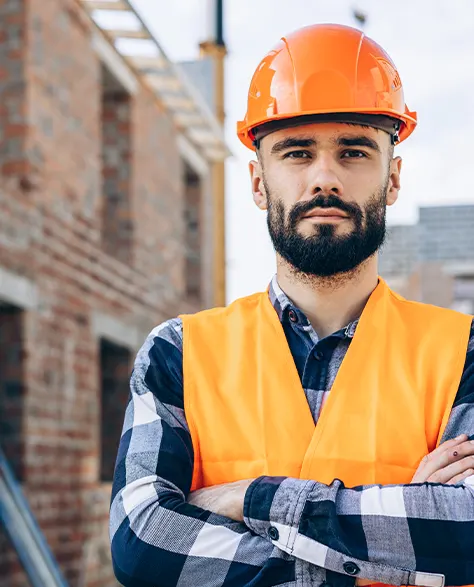 Image of Contractor Holding in a Hard Hat and Folded Arms<br />
