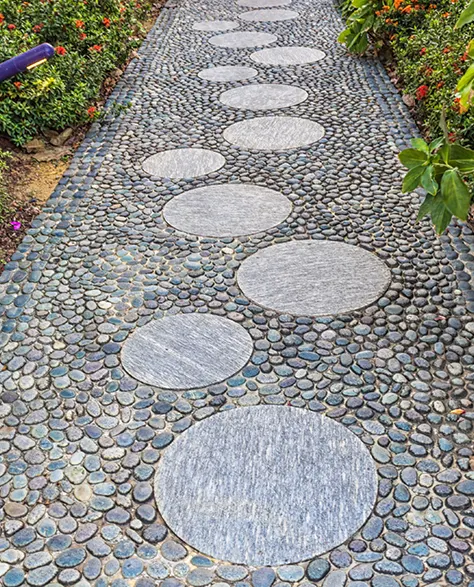 Image of Patio Pavers Installed Alongside a Beautiful Garden