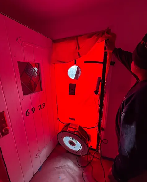 Air Sealing Installation: Blower Test being carried out by the Zavza Seal Team in a home in Long Island