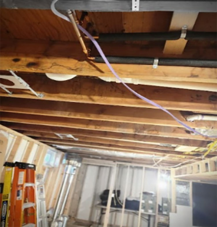 The ceiling of the property where insulation was required.