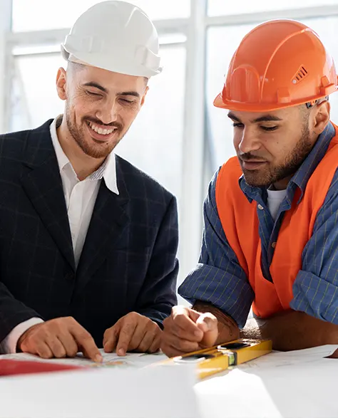 Two contractors discussing about the work